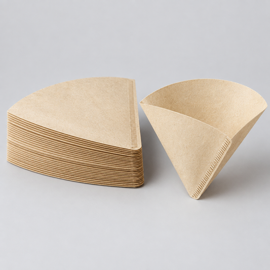 Stack of unbleached fan-shaped paper coffee filters